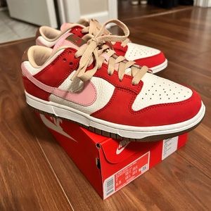 Nike Dunk Low Sneaker in Sport Red, Sheen, Sail, & Medium Brown